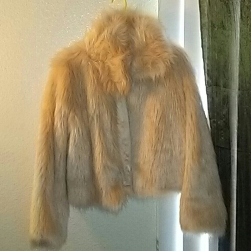 Tan fur coat.